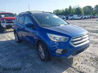 2018 Ford Escape SE with VIN 1FMCU0GD9JUA61010, listed as a IAAI auction lot 41975447 with 135,262 mi miles. Bid and sale history available at carsss.com. Image 1.