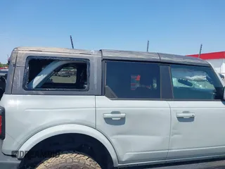 2022 Ford Bronco z VIN 1FMEE5DP3NLA80097, wystawiony jako IAAI lot #42461114 z przebiegiem 32 406 mil mil oraz . Historia ofert i sprzedaży dostępna na DreamBid. Obrazek 12.