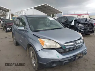 2009 Honda CR-V EX-L with VIN JHLRE38759C002661, listed as a IAAI auction lot 41956424 with 162,685 mi miles and . Bid and sale history available at carsss.com. Image 1.