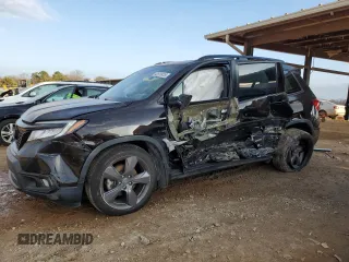 2020 Honda Passport Touring with VIN 5FNYF7H90LB005301, listed as a Copart auction lot 43875415 with 51,667 mi miles and Salvage Title. Bid and sale history available at DreamBid. Image 1.