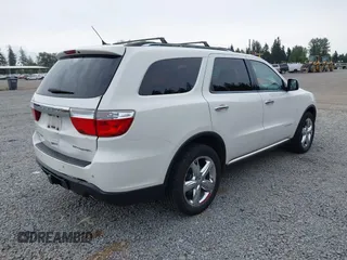 2012 Dodge Durango Citadel with VIN 1C4RDJEG8CC336957, listed as a IAAI auction lot 42309501 with 196,610 mi miles and . Bid and sale history available at DreamBid. Image 4.