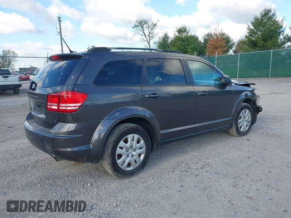 2017 Dodge Journey SE with VIN 3C4PDCAB0HT701477, listed as a IAAI auction lot 42025733 with 168,269 mi miles and . Bid and sale history available at DreamBid. Image 4.