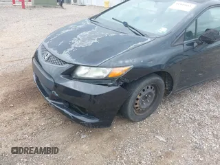 2012 Honda Civic Cpe LX with VIN 2HGFG3B59CH565932, listed as a IAAI auction lot 41949011 with 213,786 mi miles. Bid and sale history available at carsss.com. Image 6.