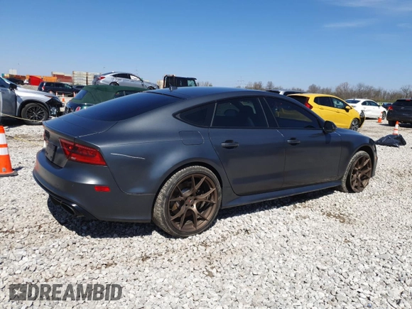 2015 Audi RS 7 Prestige z VIN WUAW2AFC8FN900610, wystawiony jako Copart lot #50708225 z przebiegiem 103 811 mil mil oraz Szkody całkowita. Historia ofert i sprzedaży dostępna na DreamBid. Obrazek 3.