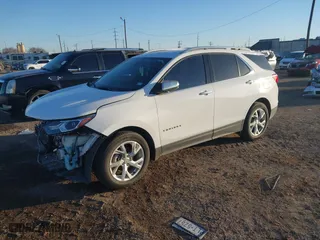 2021 Chevrolet Equinox Premier with VIN 3GNAXNEV0MS154053, listed as a IAAI auction lot 41311479 with 63,966 mi miles. Bid and sale history available at carsss.com. Image 2.