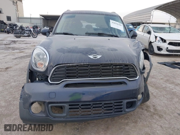 2013 MINI Countryman S with VIN WMWZC3C59DWP24390, listed as a IAAI auction lot 42038509 with 134,903 mi miles and . Bid and sale history available at DreamBid. Image 13.