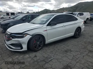 2019 Volkswagen Jetta GLI S with VIN 3VW6T7BU4KM154010, listed as a Copart auction lot 48815115 with 87,094 mi miles and Salvage Title. Bid and sale history available at DreamBid. Image 1.