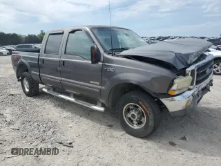 2003 Ford F-250 XL with VIN 1FTNW21P03EB89428, listed as a Copart auction lot 53090215 with 238,557 mi miles and Salvage title. Bid and sale history available at DreamBid. Image 4.