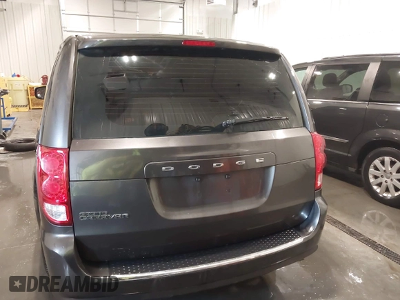 2015 Dodge Grand Caravan SE with VIN 2C4RDGBG2FR643477, listed as a IAAI auction lot 41955909 with 451,432 mi miles and . Bid and sale history available at DreamBid. Image 16.