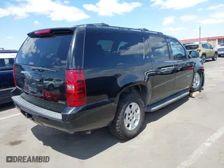 2012 Chevrolet Suburban LT with VIN 1GNSCJE00CR226285, listed as a IAAI auction lot 42059936 with 318,948 mi miles. Bid and sale history available at carsss.com. Image 4.