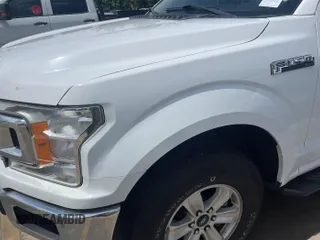 2019 Ford F-150 XL with VIN 1FTFW1E44KKC30660, listed as a IAAI auction lot 42568699 with 126,484 mi miles and . Bid and sale history available at DreamBid. Image 1.