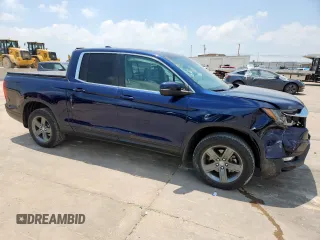 2023 Honda Ridgeline RTL with VIN 5FPYK3F50PB011150, listed as a Copart auction lot 58273325 with 38,742 mi miles and Salvage title. Bid and sale history available at DreamBid. Image 4.