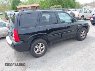 2005 Mazda Tribute S with VIN 4F2CZ96185KM16560, listed as a IAAI auction lot 42065748 with 84,584 mi miles and . Bid and sale history available at carsss.com. Image 4.