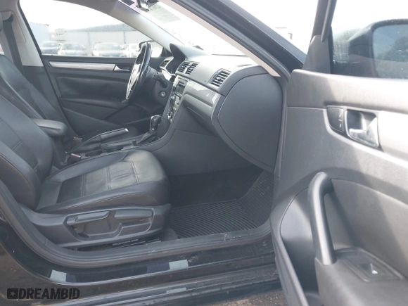 2014 Volkswagen Passat Wolfsburg Ed with VIN 1VWAS7A35EC094900, listed as a IAAI auction lot 42061090 with 115,897 mi miles. Bid and sale history available at carsss.com. Image 5.