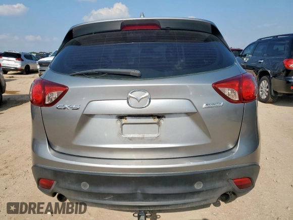 2013 Mazda CX-5 Sport with VIN JM3KE2BE5D0129797, listed as a Copart auction lot 58051185 with 200,712 mi miles and Salvage title. Bid and sale history available at DreamBid. Image 6.
