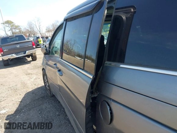 2009 Honda Odyssey EX-L with VIN 5FNRL38699B016981, listed as a IAAI auction lot 41950144 with Not Provided miles and . Bid and sale history available at DreamBid. Image 12.