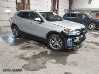 2020 BMW X2 xDrive28i with VIN WBXYJ1C09L5P35894, listed as a IAAI auction lot 41588426 with 24,476 mi miles. Bid and sale history available at carsss.com. Image 1.