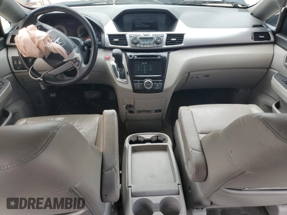 2014 Honda Odyssey EX-L with VIN 5FNRL5H68EB098207, listed as a Copart auction lot 66700024 with 161,701 mi miles and Salvage Title. Bid and sale history available at DreamBid. Image 8.