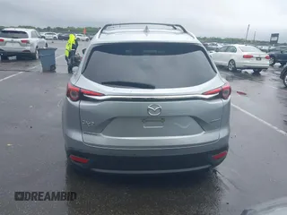 2020 Mazda CX-9 Touring with VIN JM3TCBCY8L0400787, listed as a IAAI auction lot 42188981 with 86,459 mi miles and . Bid and sale history available at DreamBid. Image 16.