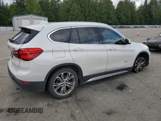 2016 BMW X1 xDrive28i z VIN WBXHT3C30G5E54396, wystawiony jako Copart lot #56042815 z przebiegiem 101 632 mil mil oraz Szkoda całkowita • Salvage title. Historia ofert i sprzedaży dostępna na DreamBid. Obrazek 3.