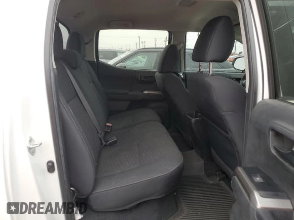 2023 Toyota Tacoma SR с VIN 3TYCZ5AN7PT114941, выставлен на аукционе Copart как лот 60172965 с пробегом 23 116 миль миль и Списание • Salvage title. История ставок и продаж доступна на DreamBid. Изображение 10.