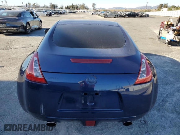 2017 Nissan 370Z z VIN JN1AZ4EH6HM952086, wystawiony jako Copart lot #88158105 z przebiegiem Nie podano mil oraz Szkoda całkowita • Salvage title. Historia ofert i sprzedaży dostępna na DreamBid. Obrazek 10.