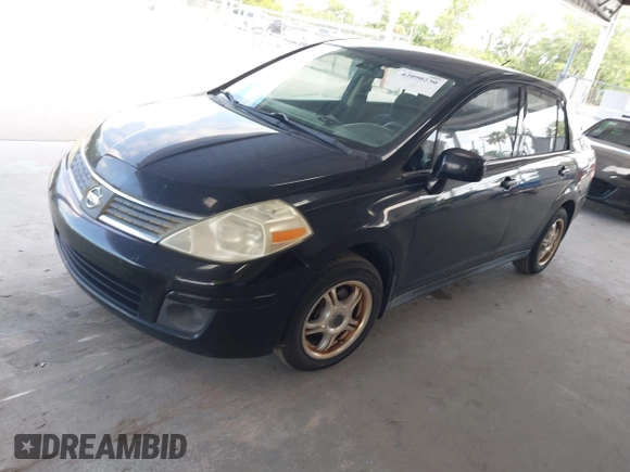 2009 Nissan Versa 1.8 S with VIN 3N1BC11E79L368680, listed as a IAAI auction lot 42090230 with 190,049 mi miles. Bid and sale history available at carsss.com. Image 2.