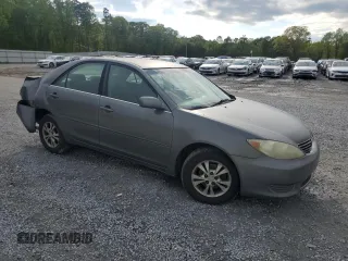 2005 Toyota Camry LE with VIN 4T1BF32K45U599214, listed as a Copart auction lot 52609295 with 304,316 mi miles and Salvage Title. Bid and sale history available at DreamBid. Image 4.