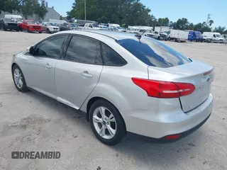2015 Ford Focus SE with VIN 1FADP3F27FL215315, listed as a IAAI auction lot 42716234 with 118,645 mi miles and . Bid and sale history available at DreamBid. Image 3.