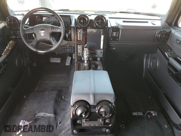 2005 Hummer H2 SUV z VIN 5GRGN23U05H117630, wystawiony jako Copart lot #57087305 z przebiegiem 60 260 mil mil oraz Szkoda całkowita • Salvage title. Historia ofert i sprzedaży dostępna na DreamBid. Obrazek 8.