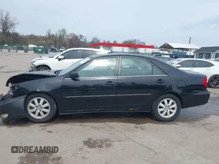 2004 Toyota Camry LE with VIN 4T1BF30K34U080477, listed as a IAAI auction lot 41956998 with 135,441 mi miles. Bid and sale history available at carsss.com. Image 14.