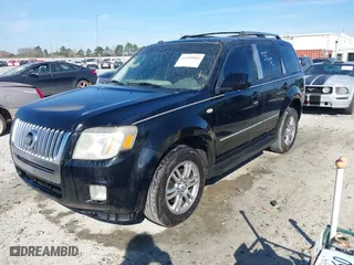 2009 Mercury Mariner Premier with VIN 4M2CU87G29KJ06738, listed as a IAAI auction lot 41659804 with 128,638 mi miles. Bid and sale history available at carsss.com. Image 2.