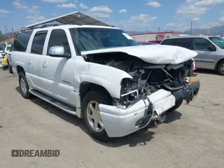 2003 GMC Yukon XL Denali with VIN 1GKFK66UX3J227538, listed as a IAAI auction lot 41915607 with 150,173 mi miles. Bid and sale history available at carsss.com. Image 1.