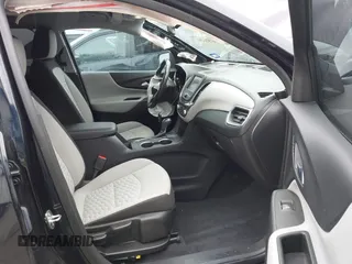 2021 Chevrolet Equinox LT with VIN 3GNAXJEV3MS118110, listed as a IAAI auction lot 41572261 with 79,673 mi miles and . Bid and sale history available at DreamBid. Image 5.