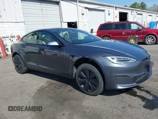 2021 Tesla Model S Plaid with VIN 5YJSA1E66MF456357, listed as a IAAI auction lot 42130286 with 48,010 mi miles. Bid and sale history available at carsss.com. Image 1.