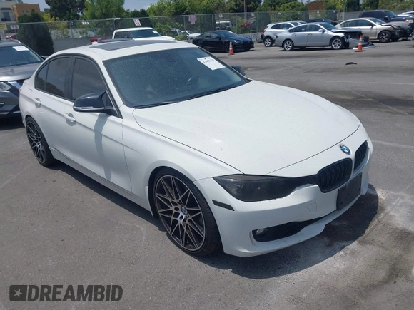 2014 BMW 3 Series 328i with VIN WBA3C1C52EK110753, listed as a IAAI auction lot 42444129 with 169,035 mi miles and . Bid and sale history available at DreamBid. Image 1.