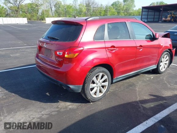 2014 Mitsubishi Outlander SE z VIN 4A4AP4AU7EE014439, wystawiony jako IAAI lot #42026513 z przebiegiem 70 963 mil mil oraz . Historia ofert i sprzedaży dostępna na DreamBid. Obrazek 4.