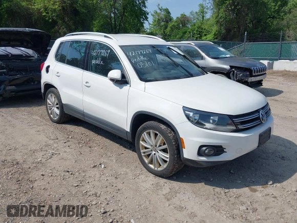 2012 Volkswagen Tiguan SEL with VIN WVGAV7AX5CW517186, listed as a IAAI auction lot 42177269 with 142,285 mi miles and . Bid and sale history available at DreamBid. Image 1.