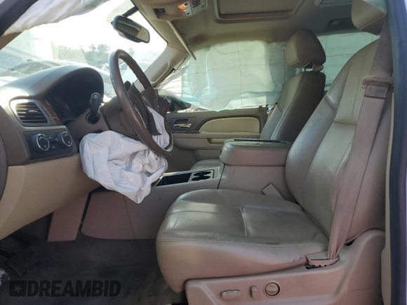 2013 Chevrolet Suburban LT with VIN 1GNSKJE74DR239851, listed as a Copart auction lot 44856425 with 203,074 mi miles and Salvage Title. Bid and sale history available at DreamBid. Image 7.