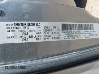 2013 Dodge Grand Caravan SE with VIN 2C4RDGBG0DR702913, listed as a IAAI auction lot 42007786 with 163,981 mi miles and . Bid and sale history available at DreamBid. Image 9.