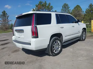 2017 GMC Yukon Denali with VIN 1GKS2CKJ4HR148397, listed as a IAAI auction lot 41942659 with 167,719 mi miles. Bid and sale history available at carsss.com. Image 4.