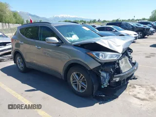 2017 Hyundai Santa Fe 2.4L z VIN 5NMZUDLB3HH047664, wystawiony jako IAAI lot #42315273 z przebiegiem 122 157 mil mil oraz . Historia ofert i sprzedaży dostępna na DreamBid. Obrazek 1.