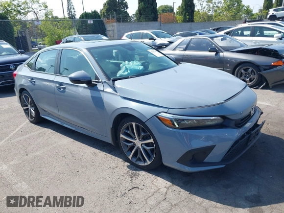 2023 Honda Civic Touring with VIN 2HGFE1F92PH322377, listed as a IAAI auction lot 42361473 with 43,533 mi miles and . Bid and sale history available at DreamBid. Image 1.