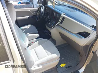 2015 Toyota Sienna LE AAS with VIN 5TDKK3DCXFS552524, listed as a IAAI auction lot 42060065 with 249,332 mi miles and . Bid and sale history available at DreamBid. Image 5.