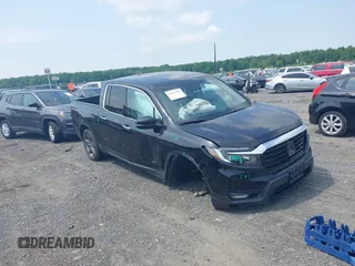 2023 Honda Ridgeline RTL-E with VIN 5FPYK3F71PB022739, listed as a IAAI auction lot 42447428 with 19,702 mi miles and . Bid and sale history available at DreamBid. Image 1.