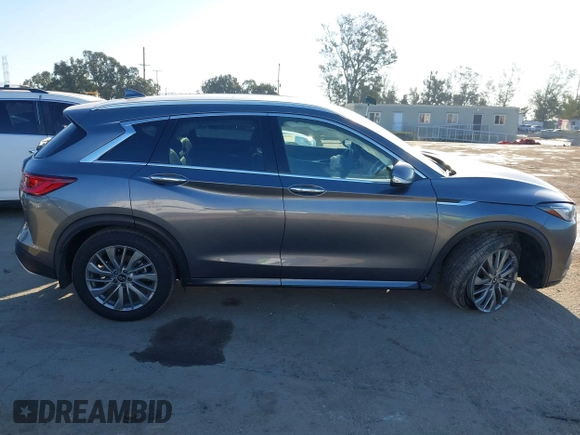 2024 Infiniti QX50 Luxe with VIN 3PCAJ5BAXRF104014, listed as a IAAI auction lot 41647475 with 7,771 mi miles and . Bid and sale history available at DreamBid. Image 13.