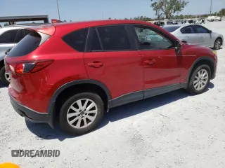 2016 Mazda CX-5 Sport with VIN JM3KE2BY1G0634797, listed as a Copart auction lot 54572155 with 170,164 mi miles and Clean Title. Bid and sale history available at carsss.com. Image 3.