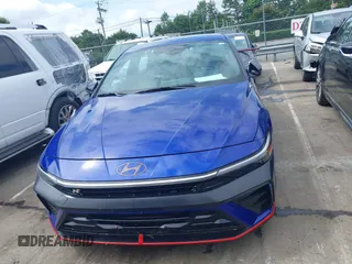 2024 Hyundai Elantra z VIN KMHLW4DK0RU020006, wystawiony jako IAAI lot #42395261 z przebiegiem 12 691 mil mil oraz . Historia ofert i sprzedaży dostępna na DreamBid. Obrazek 12.
