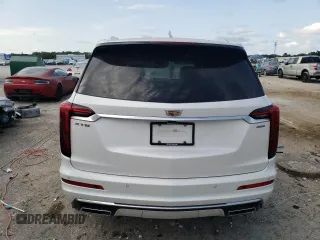 2023 Cadillac XT6 FWD Premium Luxury with VIN 1GYKPCRS5PZ120161, listed as a Copart auction lot 54614235 with 39,700 mi miles and Salvage title. Bid and sale history available at DreamBid. Image 6.