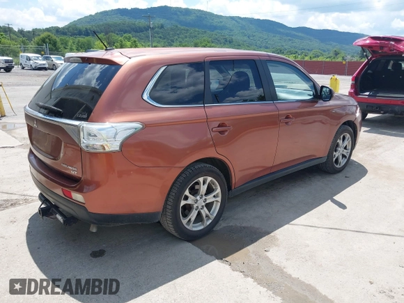 2014 Mitsubishi Outlander GT with VIN JA4JZ4AX6EZ006606, listed as a IAAI auction lot 42640681 with 161,904 mi miles and . Bid and sale history available at DreamBid. Image 4.